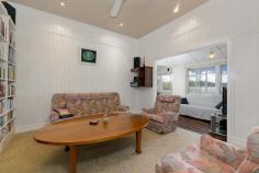 42 Dovercourt Road, Toowong, QLD, 4066 Perched high on a hill with panoramic views across Toowong to Mt Coot-tha, this classic Queenslander on 630sqm offers young families the joy of a secure grassy yard to enjoy time together and an established, fully enclosed backyard / veggie patch to tend to (serviced by a 5000 litre water tank with pump.) Situated 5.7km (10 minutes) from Brisbane City and approximately five minutes from the University of Queensland, the property has been a loving home enjoyed by the same family since 1975. With solar hot water and a big family kitchen / dining area connected to a rear patio, the living area opens to a north east aspect that captures breezes in summer and sun in winter while on the upper level still, another deck offers spectacular sunsets to enjoy. Downstairs, this property has a large downstairs living area – additional space perfect for growing needs. Located on a very quiet street, this is a special, private property to enjoy.