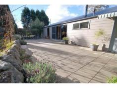 274 Bathurst Road, Katoomba Conveniently located within an easy level walk to Katoomba’s town centre, only approx. 1km away, is this newly renovated hardi-plank, brick and colourbond house. The enticing home comprises three large bedrooms, two modern bathrooms, large open plan living, modern kitchen, laundry and enclosed verandah/sunroom; with natural gas heating and slow combustion fire. The spacious third bedroom has it’s own separate entrance, allowing use as a studio flat with bathroom. Situated on a level low maintenance garden block of approx. 582m2 including entertaining patio, water tanks, single carport, single auto garage and ample off street parking. Well worth an inspection!