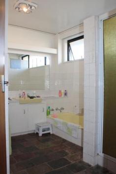 220A Best St Devonport TAS 7310 "ROOM TO SPREAD YOUR WINGS" * Spacious 3 bedroom home* Sun drenched main living area with city views* 2nd living downstairs with bathroom providing self contained option* Double length garage plus extra single garage* Paved outdoor area* Great location close to town to Nixon Street Primary