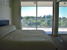 3 Parklands Blvd Brisbane City Qld 4000 Lifestyle, Location and Convenience is what this apartment has to offer. This seventh floor apartment overlooks 16 hectares of lush tropical parklands, and offers a home and a lifestyle like no other. The bedrooms are discretely separated for privacy. Upon entry you step through the open plan kitchen and living areas which have magnificent views to the Parklands. The balcony is easily accessible through the triple sliding glass doors for alfresco dining.