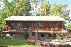 20 Smith St Clunes NSW 2480 OPEN SATURDAY 27 SEPTEMBER 10.00 - 10.30AM This rustic Western Red Cedar home on park like grounds, is priced by genuine owners to sell! After many years of happiness, travel is calling and the owners have "bitten the bullet" & put their treasured property up for sale. This 3 bedroom home has a new fully self contained one bedroom flat with internal & external access - providing additional accommodation & flexibility for guests & family alike or a great 4 bedroom family home for those with older children. Rear balcony on the upper level with entertaining patio below. Set in the landscaped grounds of 1565sqms is an in-ground pool with paths and tropical gardens. Only 5 minutes walk to buses & the Clunes General Store. Double undercover parking, plenty of side access for boats, caravans or work vans and lock up storage/workshop complete the package.