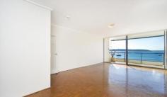 53/95 Elizabeth Bay Road Elizabeth Bay NSW 2011 Set amongst landscaped gardens, a sea pool, private marina facilities & water front BBQ area, this apartment offers an unparalleled lifestyle or an assured long term capital gains investment. Perfectly located on the fifth floor, the unit is high enough to provide panoramic harbour views yet close enough to provide the feeling of being on the waters edge. Situated in one of the most exclusive water front strata buildings in the sought after “Loop” location the unit comprises a spacious living/dining room with well maintained original parquetry floors & glass doors leading to a large balcony, 2 good sized bedrooms with built ins, the main with magnificent harbour views, ensuite & access to the north facing balcony, near new gourmet kitchen with dishwasher & stainless steel appliances, original style bathroom with bath & a separate internal laundry/storage room. Complete with a large lock up garage.