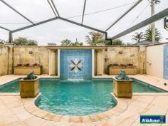 4 Kemp Pl Morley WA 6062 GRAND HOME OPEN SUNDAY 28th 12.00 to 12.45 A stunning home, designed and finished to the highest standard! This immaculately presented 4 bedroom, 2 bathroom home is full of all the (I wants). As you walk through the entry you will find yourself surrounded by beautiful ornate ceilings with quality fixings and furnishings throughout. The master bedroom with walk in robe has an ensuite which was designed way before it's time with floor to ceiling tiles and is very luxurious. The 2nd & 3rd bedrooms offer ample room and have built in robes. The 4th bedroom is currently being used as the entertainment room with built in cabinetry and block out blinds. The family bathroom also offers floor to ceiling tiles and is a modern master piece. As you enter in to the dining, kitchen and family areas which are open plan you look out over the stunning poolside retreat and patio areas, through glass sliding doors and windows that have all been furnished with ultra-chic roller blinds. The kitchen has been designed with a lot of thought for the astute cook and will simply take your breath away with its stone bench tops, top of the range appliances, dishwasher and design. This kitchen will be the envy of your friends. The reverse cycle ducted heating and cooling will keep you comfortable all year round as will the comfort of knowing the home is well secure with security doors and alarm system. As you step through the back sliding door under the huge gabled patio you will find yourself in your own little resort. The outdoor bar/ kitchen will be used year round as you sit back and watch the kids play in the heated sparkling pool in summer or the spa in winter or listening to the water features that surround the pool.