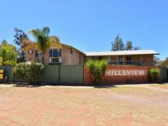 4/16 Bradshaw Drive Gillen NT 0870 With prime elevated views of Heavitree Gap as well as panoramic East and West MacDonnell Range views it will be hard to stop looking. This two bedroom first floor unit has all the trappings of the ground floor units without a private yard. There is still plenty of common area to enjoy a social BBQ, swim in the pool or just read a book in the resort style garden setting. The entire unit has vinyl flooring and ducted evaporative air throughout. Open plan living is the theme in the lounge, dining and kitchen areas while the bathroom has a bath, shower and toilet. A real bonus with this unit is a 12m x 6m insulated shed that has had a lot of detail added to the inside. Divided into sections to accommodate a garage, a storage area and a games room/studio it is still diverse enough to cater to an individuals specific needs. The grounds are immaculate and recent kerbing, bitumen & line marking make private off street parking a breeze. Priced to sell to either the astute investor or happy home owner.