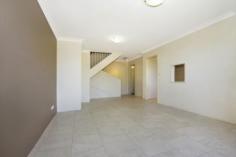 5/ 344 Pennant Hills Rd CARLINGFORD NSW 2118 This fully renovated 2 storey unit of full brick construction, is only 1 of 4 units in this complex with internal 1st floor access from the lock up garage. This whisper quiet location at the end of a long drive is tucked away from the road overlooking a green nature reserve oasis bigger than a football field (that you get to enjoy but don't have to mow!) Either enter via a newly paved courtyard that leads to your very own front door into the freshly tiled and painted living area, amazing polyurethane kitchen, large laundry with second toilet on the ground floor. A newly constructed stairwell with freshly laid carpet leads upstairs to 2 large double bedrooms with floor to ceiling built ins, lovely district nightlight views, stylish renovated bathroom, separate toilet and internal access to garage. This unit offers plenty of storage with large cupboard and an under stairwell storage downstairs and another floor to ceiling hallway cupboard on the first floor.