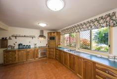 51 Ironmonger Street Calliope Qld 4680 Price Price Guide $600,000 - $650,000 Suburb Calliope Postcode 4680 Property Type Acreage/Semi-Rural Bedrooms 3.5 Bathrooms 1.5 Carspaces 9 Land Size 5 Acres YOUR OWN SANCTUARY ON TOWN DOORSTEP! Superb small acreage on the door step of town. With this package you can have it all! Literally 3 minutes to Calliope, the kids could walk to school. 5 acres of useable land, gorgeous views, spacious home and great sheds. This home has not seen to the market for over 30 years. The current owners have loved the lifestyle and maintained the property the beautifully over this period. Surrounded by glorious easy care gardens privacy is assured. A completely transformation took place 14 years ago to bring the home to its current standard. Entertaining options are plentiful with rural or mountain views from every corner. Inside the house has been design to capture these for nearly every room. The chef is the home with love the amazing Black Wattle kitchen with gas cook top and electric oven, range hood and loads of storage and bench space. Tiled open living space beautifully appointed. Massive laundry with storage that anyone would be envious of and then there is the linen cupboard. BIG bedrooms all are built-in and have sliding doors to access outside, giving great ventilation. Huge bathroom with floor to ceiling tiling, separate bath and shower and corner to corner vanity. Two 3 bay sheds both with power. 1 with 2 automatic roller door, new paint and there is even a toilet! The man around the home will be in his element. Add 100+ Mangoes, full fencing, town water and bore. Seeing is believing here.