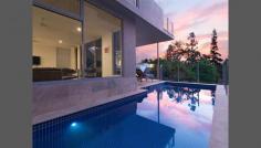 96 Central Ave St Lucia QLD 4067 In A Class Of Its Own Set back from the road in a very quiet enclave is this 2 level split level residence, less than 3 years old. Built to exacting standards for a lifetime of quality living including suspended concrete floors and walls. The brilliantly proportioned living zones encompasses open plan living. The separation of bedrooms and living space offer 425sqm of total privacy. The family area features a Escea Gas fireplace, and glass doors that flow onto outside entertaining with fabulous views over St Lucia. Enjoy your designer kitchen, featuring Butlers pantry, Miele appliances and Caesar stone bench tops with white 2 pak cabinetry. Zip tap. - Marble floors throughout, carpeted bedrooms - Luxury Master bedroom, dressing room and ensuite - Self contained lower level - Ducted air conditioning throughout - Spacious laundry with hanging space - TV Cable & Internet to all living & bedrooms - Bose integrated Speakers - Video Intercom & Security - 5.5kw Xantrex Solar Power - Tiled salt water pool - Multiple low maintenance lawn and outdoor living areas - 594sqm - Close to University of Queensland, Ironside State School, City Cat, Buses, Toowong Village, Indooroopilly Shoppingtown. Only 5kms to CBD.