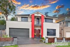 5 Nicholls Way PEMULWUY NSW 2145 Riverbank Real Estate is proud to present possibly Pemulwuy’s largest Torrens tile block. Tucked away & beautifully presented, this family home boasts a generous 903sqm landholding with a spacious and welcoming split level home. Offering a large side access to the rear yard this property would potentially suit tradesman’s vehicles, boat, caravans etc. A relaxed family retreat with privacy and style, however easily transformed to a versatile entertainer with large outdoor living & kitchen. Features Include; * 5 Bedrooms plus study * Three bathrooms, spa to ensuite * Custom Kitchen with walk-in pantry * Informal lounge/Dining * Sunken formal lounge * Separate media room * Upstairs living room * Ducted air conditioning * Ducted Vacuum * Solar Power