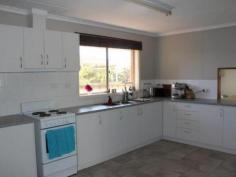 23 ROSS AVENUE Newman WA 6753 This recently partially refurbished brick and tile 4 Bedroom home is situated in a quiet area amongst established homes and a short car ride to town CBD. The front of the property presents well, and is neat and tidy with low maintenance lawn and large family friendly backyard is ideal for the busy Pilbara Lifestyle. PROPERTY FEATURES: 4 Generous sized Bedrooms with BIR Large Lounge Light and inviting Separate Dining Refurbished Kitchen with ample storage and functional refurbished with servery Tiled Living and Kitchen areas in marble look ceramic tile painted in neutral tones Split system A/C throughout Patio to side of property overlooking backyard Large Family friendly yard with raised levels and garden beds Large Workshop to rear Fully Fenced Currently leased at $1400 per week Company lease until April 2015