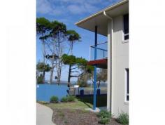 7 / 26 Esplanade Tin Can Bay Queensland 4580 Executive style 2 storey 3 bedroom villa with 2 bathrooms, 3 toilets and 2 car accommodation. Spacious open plan living, kitchen with granite bench tops, stainless steel appliances and dishwasher. Master bedroom ensuite has a spa to relax in, bedrooms have built-ins and ceiling fans. Enjoy the privacy of your own courtyards and 2 balconies and views. 170sq m. The view can never be built out. Close to Tin Can Bay Marina.