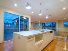 2 Stevedore St Williamstown VIC 3016 Simply Stunning. A truly spectacular brand new home located on the footsteps of one of Melbourne's most prestigious waterfront addresses, The Strand. Featuring exceptionally large reverse living and dining spaces with gas fireplace, front facing entertainers' balcony plus second terrace balcony at rear, taking in outstanding bay and city views. Designer kitchen with two Miele ovens, beautifully finished with Caesar-stone bench-tops, insinkerator and butler's pantry. Three ground floor bedrooms with Daikin split system cooling/heating and their own stunning bathroom, master with dressing room/walk-through robe and stone bath. Ground level landscaped gardens is the perfect space for the kids to play. It is also a wonderful area with direct access off a generously proportioned family room/formal living zone. Huge double garage with tiled floor, ideally suited for entertaining via bi-fold glass doors to rear rendered walled outdoor living area. Also features evaporative cooling upstairs, full security system plus a ducted vacuum system. All literally a one minutes walk from the Nelson Place eateries and the Strand foreshore area. Further details and private inspection by calling; Anthony Gunn 0409 377 449 Kevin Gunn 0418 997 914