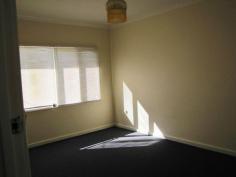 89 Caw St Merredin WA 6415 This home features 3 bedrooms with relatively new carpet, venetian blinds and clean paintwork. The front lounge room has a wall unit air conditioner to keep you comfy. The bathroom is dated but functional and clean. The kitchen has a gas oven and stove and room for a dining table. Rear laundry and separate toilet. On a large block and fully enclosed rear yard with double gates. Please call us at the office on 9574 2917 and speak to Tony or Tiffany to arrange a time to view this property.