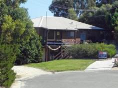 4 Hatch Pl Guilderton WA 6041 New Price $575,000 Invest In The Future Are you seeking to acquire a solidly constructed Guilderton / Moore River home with ocean views that will endure long into the future without any additional structural outlay but still has scope to value add and personalize to your own requirements? 4 Hatch Place certainly fits that profile with solid brick & iron two storey construction, a flexible floor plan, internal and external stairs, four large bedrooms, more than ample storage, roller-door access to lower level if required and a large shed with concrete floor, power & additional toilet. The 1042 sqm tree lined land holding is positioned perfectly in a private cul-de-sac setting within easy distance to absolutely 'everything' which makes this idyllic coastal community so unique...just like having your very own private enclave... If you're seeking a private weekend escape, a relocation opportunity, location / lifestyle investment or simply just a 'scene change' - this is certainly the place for you! This is long term value, priced to please - all Offers presented. Why not come along and see for yourself....easy to view at any time by appointment. Please call Marg (0429 808 146) to arrange.