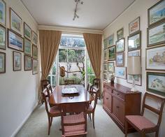 5/275 Edgecliff Rd Woollahra NSW 2025 A peaceful mews-like setting, sunny north aspect & generous proportions make this
townhouse a wonderful easycare home. Secluded from the road at the end of a private drive,
Kew Place is a boutique collection of 12 residences reminiscent of an English mews &
located between the chic attractions of Queen Street Village & the leafy tranquillity
of Cooper Park. The first time offered in over 30 years, it features a spacious dual
level layout with potential to create a fourth bedroom or study & is close to
Edgecliff station & Westfield Bondi Junction.
Whisper-quiet rear setting, private entry and wide foyer Bay fronted living room bathed in all day northerly sun Dining room opens to a wisteria-framed courtyard Modern granite kitchen, breakfast room or sitting room 3 large bedrooms with built-ins, fresh main bathroom Sun filled master bedroom with en-suite bathroom, walk-in robe sunny balcony & park views Enormous laundry room with scope to create a 4th bed Downstairs powder room, wine cellar, visitor parking Double garaging with mezzanine storage and internal access Generous indoor/outdoor living, scope to update