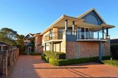 4/213 Ocean View Rd Ettalong Beach NSW 2257 This attractive townhouse apartment is located near the beautiful Ettalong Beach waterfront in a full security complex ! Enjoy this exclusive position so close to the popular Ettalong markets, restaurants, cinemas and marinas .Boasting luxurious appointments throughout that include 2 full bathrooms, ensuite, 4 spacious bedrooms, main with walk-in robes! Impressive lounge and dining room views a landscaped courtyard awash with natural light! Fabulous interiors, stunning kitchen with all modern appliances and includes a new self-cleaning Miele oven!All year comfort is guaranteed with split system air-conditioning on both levels.This private residence is surrounded by sensational sculptured gardens !The property has 2 secure car spaces and a separate locked storage area assigned to this property . An absolute pleasure to inspect !