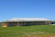 29 Derna Road Robinvale Vic 3549 Not only are there heaps of rooms but they're all much larger than average. Set on approx. 1 acre is this 4 year old 50.4 sqm UMR home. 3 large bedrooms - BIR plus Master with over sized ensuite. Kitchen features chef's stove, huge WI pantry & loads of bench space. The open dining & family area overlook the grassed fully fenced yard. Formal entry & Sep lounge room, also a TV room/study. Sweeping verandas, 3 phase ducted R/C air con, Dbl garage with extra toilet. Space for a vegie garden under watering system. Water storage is no problem with 2 x 23,000lt tanks to cater for your 3 Megs & rain water. The entertainment area comes complete with BI brick fireplace. To complete this package is the man shed approx 7.5 x 12m, concrete floor, kitchenette, 3 phase power. A real man's cave!. You will find all this & so much more on this property. Only minutes from Robinvale. An inspection will impress.