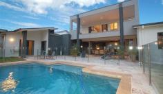 8-10 Kambah Pl Reedy Creek QLD 4227 STYLE FOR HARMONIOUS INDOOR/ OUTDOOR LIVING $999,000 Web property id: CBS583 Elevated within the heart of ‘The Observatory’, this master built Sanctuary 28 residence presents two levels of contemporary living appointed to the highest standards. Enjoy the peaceful park surroundings. • Beautiful formal lounge/dining area has spotted gum floors • Entertaining area enjoys a sparkling pool outdoor shower and park views • Caesar Stone bench tops, kitchen equipped with Smeg appliances • Family bedroom wing enjoys a stylishly appointed bathroom • Top floor main has an opulant ensuite and a large deck overlooking Surfers Skyline views. • Sounproof hobby/rumpus room plus an Italian tiled family living area • Air conditioned, Vacuum Maid, intercom and surround sound • Toowoomba sandstone paving plus landscaped gardens and lawn • Triple car garaging, plus extra space for a van/boat • Set on a 1,143sqm block opposite parklands Located within minutes drive to private and public schools, public transport, Varsity Train Station ,Local Shopping Centre and 20 mins to Burleigh Beach.