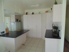 61 Charles Street KENILWORTH Qld 4574 This 4 bedroom home is a Cracker..... New Kitchen Formal lounge & spacious family room 2 bathrooms & toilets Covered front verandah Enormous covered deck with great views Hardwood chamferboard on exterior walls Double carport and double roller door garage for 4 cars on 800m2