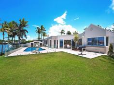 5713 Anchorage Terrace Sanctuary Cove QLD 4212 Pristine Refurbished Waterfront - Prime Location This luxurious single level residence is within the most prestigious waterfront area within Sanctuary Cove and enjoys the widest river expanse with a North to North East aspect. Fully gated and completely refurbished to an exceptional standard; it has spectacular vista to the main river. Sprawled across 1375m2 of prime land with a north easterly aspect, the interior of the home is spectacular and stylish but also offers a relaxed atmosphere where the water is visible from all indoor living areas. No expense has been spared on the interior of this delightful property which includes: *Formal entrance with chandelier *Sumptuous master suite with a stunning ensuite and dual walk in robe *2 king size bedroom suites set apart from the master *Gentleman's study with own access (could be a media room) *Stunning guest powder room *Kitchen with uninterrupted water vista *Concealed temperature controlled wine storage room *Concealed bar *Lounge and living area overlooking the river *Large fully fenced resort style pool on the water's edge. *Mooring to accommodate a very large boat *Easy care lawn and garden General Features Property Type: House Bedrooms: 3 Bathrooms: 4 Indoor Features Ensuite: 3 Living Areas: 2 Toilets: 4 Alarm System Indoor Spa Study Floorboards Broadband Internet Available Built-in Wardrobes Dishwasher Ducted Vacuum System Ducted Heating Ducted Cooling Outdoor Features Remote Garage Secure Parking Garage Spaces: 3 Open Car Spaces: 4 Courtyard Outdoor Entertaining Area Fully Fenced Swimming Pool - Inground