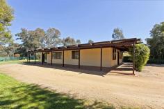 108 Anzac Rd Springhurst VIC 3682 BREAK INTO THE MARKET
$224,500
Thirty minutes down the freeway from Wodonga sits this large family home in Springhurst township. With
four bedrooms, all with built in robes, a large open kitchen and
renovated bathroom, this property provides a perfect opportunity to get
started in the real estate market. You will find a slow
combustion wood heater, refrigerated air conditioner, and a split system
heating and cooling unit to keep the elements at bay. There is a
generous allotment of almost half acre. The grounds include a large
shed with concrete floor and power, an 8m x 8m (approx.) carport, a
permanent well and a 22,500 litre water tank for your garden watering
needs plus a fantastic in-ground salt chlorinated pool for those
leisurely summer afternoons with family and friends. Situated
just 1.5 kilometres from the Hume Highway and strolling distance from
the local primary school, parks, and the local railway station, it is a
great location. Ideally positioned between Wodonga, Wangaratta and the
award winning wine region of Rutherglen. To learn all the features to this property, please contact Tony Stockdale on 0428629778 to arrange an inspection today.