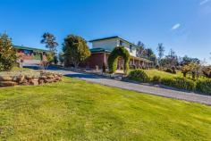 307 Winkleigh Rd Exeter TAS 7275 Property Information This superbly presented residence is located just on the edge of Exeter, in an elevated position looking over the surrounding countryside. The post and rail fences invite you to drive in, with the option of which garage door to open with the remote, or pull-up outside on the large parking area. The home offer generous sized rooms throughout, including the near new kitchen, the 3 downstairs bedrooms; 1 a separate sitting room currently; the 2 bedrooms upstairs; all immaculately maintained and presented. The main bedroom has an ensuite and a walk in robe; more the size of another room; the others built-ins. The sunny living area opens onto the patio and verandah and enjoys the gorgeous rural outlook. Outdoors there is the double garage + workshop, a dog run and tack shed, with 2 paddocks now, 3 paddocks an easy option - room for the pony! Exeter's village shops, both high and primary schools, Doctors and bank are a 2 minute drive, with Launceston only 20 minutes away. Floor Area 224 sqm Land Size 7942 sqm Tenure Freehold Approx year built 1985 Property condition Excellent Property Type House Garaging / carparking Double lock-up, Auto doors (Number of remotes: 2) Construction Brick veneer Joinery Aluminium Roof Iron Flooring Tiles and Carpet Window coverings Drapes, Blinds (Timber) Heating / Cooling Woodfire, Ducted Chattels remaining All fixed floor coverings, all light fittings, all window furnishings, wood heater, Bosch dishwasher, convection microwave, wall oven, cooktop, remote garage door system x 2, garden shed, dog run, clothes line. Kitchen Designer, Dishwasher, Separate cooktop, Separate oven, Rangehood, Double sink, Breakfast bar, Microwave and Pantry Living area Open plan Main bedroom King and Walk-in-robe Ensuite Separate shower Bedroom 2 Double and Built-in / wardrobe Bedroom 3 Double and Built-in / wardrobe Bedroom 4 Double and Built-in / wardrobe Bedroom 5 Double and Built-in / wardrobe Main bathroom Bath, Separate shower Laundry Separate Workshop Combined Views Private, Rural Outdoor living Entertainment area (Partly covered) Fencing Fully fenced Land contour Flat Grounds Backyard access, Tidy, Other (tack shed and dog run) Garden Garden shed (Number of sheds: 1) Water heating Electric Water supply Town supply Sewerage Septic