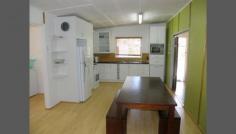 68 Mooloomba Road, Point Lookout, QLD 4183 No need to use a vehicle if you are holidaying at this well established home which is situated on the ocean side of the main road in between Deadman's and Frenchman's Beaches. The property is perfectly positioned to take advantage of the holiday rental market as there is no need to cross the main road to walk to the beaches. Both beaches are only just over 5 minutes walk away and the patrolled Cylinder Beach just a touch further. The township's supermarket, takeaway and Post Office are just down the road with the popular Gorge Walk and the Point's cafe precinct a similar distance towards Main Beach.