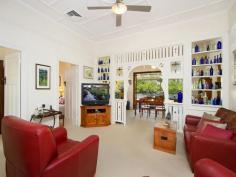 35 Woodrow Dr Coorparoo QLD 4151 Perfect as is....but packed with possibilities! In one of Coorparoo's premier locations, sheltered by towering palm trees, rests this gorgeous original Queenslander. Faithfully restored and maintained by its current owners (only the second in its 90 year history!) the residence and its vast block are a 'must-see' for those seeking a timeless home with plenty of room to grow. Rich in original features, including 11ft VJ walls, stained glass windows, decorative fretwork and traditional lights, its old-world charm has been skilfully preserved. Yet, modern updates in the kitchen, bathroom and home's structure ensure comfortable and low-maintenance living. Specifically, the property now boasts ducted air-conditioning throughout, stainless steel Smeg kitchen appliances as well as new plumbing, roof and electrics. Offering perfect spaces for today's growing family there are also endless possibilities for the future. The spacious living areas lead through French doors onto the expansive covered rear deck. A delightful place to entertain, this resort-style outdoor area overlooks an enormous, fully-fenced garden and patio, where the kids (existing or planned!) can ride bikes, play and explore. Meanwhile, you can sip drinks at the deck's bar while chatting freely with the resident 'chef' through the bi-fold kitchen windows! The upper and lower outdoor areas are conveniently linked by a staircase; an ideal inclusion should full advantage be taken of the huge yard, and a swimming pool constructed. Three good sized bedrooms (one with built-in-robe) are serviced by a central bathroom featuring claw-foot bathtub and a separate toilet. The third bedroom could equally function as a home office with convenient entrance at the front of the home. But, should more rooms be desired, the 744sqm block and layout of the residence offer significant potential to remodel, extend the home's footprint on the existing level or raise and build in underneath. Located in a highly sought-after street, surrounded by million-dollar homes, investment in this address would be an investment in the future! And the lifestyle accompanying this locale has seen it become exceptionally popular for families and professionals alike. It is just 5km from the CBD, a short walk to Coorparoo railway station, on the doorstep of Wembley Park with access to walking and riding tracks, and within close proximity of private and state schools, shopping amenities and café/dining precincts. The owners have loved and nurtured this traditional home for nearly two decades. But now, with an interstate move fast approaching, their instructions are clear.. It must be sold! Seize the opportunity and inspect now! Property Snapshot Property Type: House Construction: Weatherboard Zoning: Inner Residential Land Area: 744 m2 Features: Air-Conditioner in Main Bed Airconditioned Built In/s Close to Parks Close to Schools Close to Shops Close to Transport Deck Dining Room Dishwasher Established Gardens Fenced Back Yard Fenced Front Yard Garden Shed Gas Hot Water Gas Stove Hardwood Timber Floors Lock Up Garage Lounge Room Outdoor Entertaining Quiet Street Renovated Separate Toilet Spacious Stainless Steel Appliances Storage Study Suburban Views Sunroom Undercover Entertainment Area Water Tank