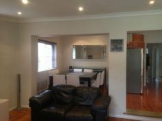 10 Warejee Street Kingsgrove NSW 2208 This well presented family home offers 3 bedrooms of accommodation all with built in wardrobes, modern kitchen with stainless steel appliances and gas cooktop, polished timber floorboards, A/C, external laundry with 2nd toilet, large backyard with rear access to the park, single lock up garage. Located only walking distance to all local amenities such as public transport, shops and schools.