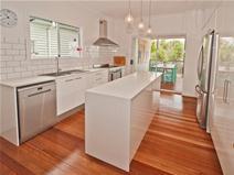 11 Duke St Brighton QLD 4017 Fully Renovated 500m To The Waterfront! Offers Over $539,000 From the moment you open the front door you will be impressed by this fully renovated home where open plan living flows out to the large covered deck overlooking the leafy backyard. The kitchen comes complete with an island bench, granite bench tops, masses of storage and stainless steel appliances including a 900mm cooktop/ oven and dishwasher. Both bathrooms are immaculate featuring floor to ceiling tiles and waterfall shower heads. The main bathroom has a bath and the ensuite boasts an extra -large shower. The master bedroom is carpeted and features a large walk-in-robe and ensuite. The home features polished floors, ornate cornices, freshly painted inside and out, lock up garage, carport and loads of storage under. The yard is fully landscaped, fully fenced and comes complete with your own private courtyard. The Brighton shops are at the end of the street, and waterfront an easy walk. I could go on forever but the best thing to do is inspect, which will surely follow with an offer to purchase this immaculate property. Map Data Terms of Use Report a map error Map Satellite 100 m Property Type House Property ID 11686100085 Street Address 11 Duke Street Suburb Brighton Postcode 4017 Price Offers Over $539,000 Land Area 405 sqm