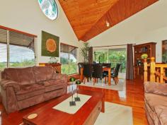 7 Jessica Ct Eatons Hill QLD 4037 Well here it is, a once in a lifetime chance to purchase an
architecturally designed, award-winning home full of character and
pizazz. In winter, sit in the comfy lounge/dining room with glorious
raked timber ceilings, being warmed by the pot belly and in summertime
enjoy a relaxing drink outside on the huge verandas, catching the NE
breezes, looking out over the treetops and the sparkling pool, all set
in a beautifully laid out garden.
The large main bedroom and en-suite is located up on the mezzanine
floor, and even has a private balcony. With 2 more bedrooms downstairs,
another bathroom, a kitchen with granite workbenches leading into a
spacious air conditioned family room and more, this home has plenty of
room to move around in!
This wonderfully welcoming residence is sure to delight your senses and excite you on inspection.
Key Points Features
High raked timber ceilings Wonderful wrap around deck Natural timber floors Sparkling in-ground pool Spacious bedrooms 814 sqm allotment An inspection is worth your while