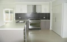 4 Bishopwood Court Upper Coomera Qld 4209 This beautiful home features - downstairs - open plan study, open plan kitchen with plenty of cupboard space, the latest in stainless steel appliances including a gas cooker, stainless steel dishwasher. Separate tiled dining and lounge room, powder room, separate laundry. Upstairs - family room, master bedroom with walk in robe, ensuite with double basins and private balcony, modern family bathroom with bath tub, all other bedrooms have built in robes. This home has full ducted air conditioning, vacuum maid system and alarm system. Under cover patio area, large fully fenced backyard, double lock up garage. Close to schools, parks, Upper Coomera City Centre and the M1.