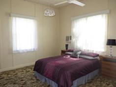 33 King Street GLOUCESTER NSW 2422 For over 60 years this family home has gathered family memories. Mostly in original condition, in good order and well maintained this terrific four bedroom home is located right in the heart of Gloucester. The lounge is spacious and there is a separate dining area. The kitchen is easily accessible, functional and has been upgraded since the home's construction. The bathroom is original and as they say “retro” is fashionable.
