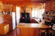5196 Great Eastern Highway, Clackline WA 6564 Beautifully presented rural home, grounds and property. Set high on an elevated site this property commands wonderful views of the rambling hills of the Avon Valley. If you are seeking a property a little out of the ordinary, then an inspection is a must. Your home has an eclectic style with a mix of large bricks on the ground floor with the second storey, cedar and iron, you have extensive brick paving and retaining walls surrounding the home and an outdoor paved kitchen entertaining area.
