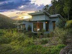 277 Ravensdale Rd Ravensdale NSW 2259 Misty Valley
With breathtaking views and some of the most fertile land in the
Yarramalong Valley this 61 acre (approx.) parcel once owned by John Laws
as part of his original holding, offers the ultimate in versatility.
Add to this a stunning home designed by acclaimed architect Peter
Ireland, complete with self contained studio, all sitting perfectly into
the landscape. Simply stunning!
Easy living provides a seamless flow from inside to out. Polished
timber floors, raked ceilings and high end finishes leave nothing to
chance, sure to impress the most discerning buyer. From the master suite
through to the open plan kitchen and lounge spilling out to the
sheltered alfresco deck, the perfect place to entertain family and
friends. The ideal place to get away from the hustle and bustle for
weekend breaks or stay just that little longer. Whether it’s just the
family, in laws, your own private master suite or holiday accommodation
the separate studio adds to the versatility of this amazing home.
It does not end there. A substantial investment has been made in
infrastructure giving this property the flexibility to cater for many
pursuits from the budding cattle baron to the horse enthusiast, fully
fenced in post and rail, with large 4 bay shedding complex, feed shed,
tack room, watered paddocks and direct river frontage. If you have been
waiting for your dream property to come along, this may well be it!
