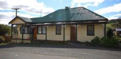 990 Ellendale Road, Ellendale TAS 7140 Here is a great opportunity to purchase a property where you could live in one part and rent out the other or set the property up to be a B&B, the property is co-joined with one part having two bedrooms and the other part having one bedroom, both areas have their own kitchens and bathrooms along with separate living areas. The property is set upon approximately 1 acre (3888m2) of flat land with cottage style gardens at the rear. There is the added bonus of town water and the home is ideally located 30 minutes to New Norfolk and 45 Minutes to Hobart's Northern Suburbs. Call today to arrange an inspection!!