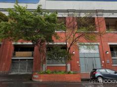 4/99 Oxford St Collingwood VIC 3066 A superbly maintained warehouse apartment within the historically significant Foy and Gibson building. Spacious and light filled this first floor apartment features two double bedrooms (master with BIRs), open plan kitchen/living opening to large (covered) outdoor terrace/winter garden, central bathroom, Euro laundry and two secure undercover car parks (tandem). Other features include air conditioning, polished timber floor, stone bench tops. An unbeatable position and sought after location with immediate access to the CBD, Smith Street, Brunswick Street, transport, shopping and cafes. An imposing heritage facade will impress the owner occupier or investor seeking security and affordability with timeless appeal.
