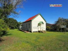 12 Gympie St Torbanlea QLD 4662 CHURCH ON 1012M2 (1/4 ACRE) For Sale a remarkable building which has been a central land mark for the community of Torbanlea for more than a century. This well loved property exudes that warmth of character one feels when entering a loving caring & safe environment. Currently Zoned for use as a community facility and would suit Community activities, clubs, indoor sports clubs, or child care and more. The potential is there to convert this wonderful building into a residential dwelling, Fraser Coast Regional Council has advised that such a change of use is Impact accessible and would require an application for change of use. Once this has been completed then simply an application to FCRC with conversion plans and building application, and you'll then have a remarkably unique home, with an equally rich place in this wonderful communities history.