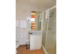 4/6 Wattle Drive Scamander Tas 7215 2 BEDROOMS, RIVER VIEWS, GREAT LOCATION For Sale Suitable for owner occupier and investors this fully furnished 2 bedroom unit is located in Scamander within Blue Seas Holiday Villas. It offers good views over the Scamander River and a short walk to the white sands of Scamander Beach and river mouth with plenty of activities on your doorstep including beachcombing, great fishing, swimming, renowned surf breaks, cafes, golf course and hotel all within close proximity to this fantastic holiday unit. This ground floor unit consists of two good sized bedrooms with built-ins, open plan kitchen/dining and lounge, bathroom, front porch area with table and chairs, parking at the front door and level access. From the lounge, kitchen and main bedroom, views of Scamander River can be enjoyed all day. Owners and guests have access to an indoor pool, games room, laundry and BBQ areas, ideal for entertaining and relaxing. With everything in great condition, this is an ideal opportunity to live in a great location or invest for the future while taking advantage of being able to enjoy holidays in this relaxing atmosphere and receive an income from the holiday rental during times you are not using it yourself. Take the opportunity to invest today and start the income stream while you plan your next holiday to this idyllic location. Sale Details $160,000 ONO Features General Features Property Type: Unit Bedrooms: 2 Bathrooms: 1 Outdoor Open Car Spaces: 1 Inspections Inspections by appointment only.