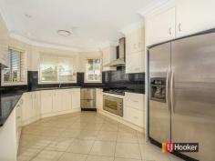 14 Rustic Place Woodcroft NSW 2767 OPEN HOME THIS SATURDAY 12:00 - 12:30PM Yes that's right a 7 bedroom home fit for 2 families! - Double sized master bedroom with ensuite spa and walk-in wardrobe - Bedroom 2 with ensuite - Built-ins to all bedrooms plus ensuite access to bedrooms 3 and 4 - Formal lounge plus separate dining - Up to date granite kitchen with stainless steel appliances, walk-in pantry and gas chefs oven overlooking meals room - Large family room plus rumpus room perfect for those who love to entertain - 5 Toilets in total with 2 bidets - Double garage with internal access - Large backyard with plenty of room for the kids to play - A host if quality inclusion with ducted a/c, down lights, stenciled concrete and multiple storage areas Read more at http://woodcroft.ljhooker.com.au/G5FFHR#lWh21BEo7DLCb7pC.99