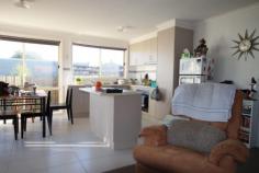 2/378 Rossiter Road Koo Wee Rup VIC 3981 INVEST OR NEST! So private, yet close to everything! Near new 2 bedroom townhouse with single garage. Light filled kitchen (dishwasher) & living area, reverse cycle split system, remote garage, garden shed and water tank. Low maintenance for an easy life style. Call me to arrange your inspection today! (Currently Tenanted $1000PCM until 31/01/2014) General Features Property Type: House Bedrooms: 2 Bathrooms: 1 Land Size: 173 m² (approx) Indoor Features Built-in Wardrobes Dishwasher Outdoor Features Remote Garage Garage Spaces: 1 Courtyard Shed Fully Fenced
