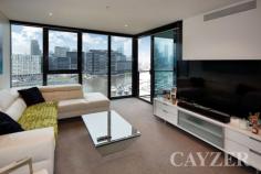 1105/1 Point Park Crescent Docklands VIC 3008 INCREDIBLE LIFESTYLE, AMAZING VIEWS Relax and soak up the amazing uninterrupted views across the Yarra River, marina and city skyline from this astounding apartment set in the boutique 'Yarra Point Complex'. Impressively large, comprising: Spacious open plan living and dining area, adjoining terrace with breathtaking views, gourmet kitchen (with stone bench top, glass splashback and ample storage), large bedroom (with built-in robes and access to terrace) and stylish central bathroom with separate European laundry. Features: Intercom, central heating/cooling, one secure car space, access to gym and RedDek pool and spa. Enjoy easy access to public transport with parklands, cafes, restaurants and shopping only a short stroll from your doorstep. Currently leased until February 2015 returning $1,955.00 per month. Inspect during scheduled open times or by appointment with the agent. Presented by Cayzer Real Estate Port Melbourne. ALL ENQUIRIES MUST INCLUDE A PHONE NUMBER. ** No Board On The Property. General Features Property Type: Apartment Bedrooms: 1 Bathrooms: 1 Outdoor Features Garage Spaces: 1