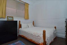 30 Buller Street Kalgoorlie WA 6430 MORE THAN MEETS THE EYE This pretty 3 x 1 central Kalgoorlie home has way more than meets the eye. Situated on a quarter acre block (1012m2) with 20m frontage and rear lane access within the South Kalgoorlie Primary School zone. The fibro home consists of 3 bedrooms with built in robes to the master bedroom. One bedroom has original pressed tin walls which are delightful. Also inside the home is a study, a sleep-out and a utility room, all of a suitable size. Combined modern, tiled kitchen/lounge area with gas cooktop, electric oven and excellent bench space. Gas heating plus the option of reverse cycle air-conditioner for year round comfort completes this comfortable living space. There is also a formal dining room with new carpet. The bathroom features a bath, shower and vanity with separate WC. As an added bonus there is a second WC outdoors. Horse stables are in place at the rear of the block plus many bird cages for the enthusiast. 2 workshops and an easy care garden complete with established fruit trees make this an attractive family home. Last, but by no means least, there is a horse stable registration in place for this property until 30/6/2015 General Features Property Type: House Bedrooms: 3 Bathrooms: 1 Land Size: 1012 m² (approx) Indoor Features Toilets: 2 Air Conditioning Outdoor Features Carport Spaces: 2 Other Features Built-In Wardrobes,Close to Schools,Close to Shops,Close to Transport,Garden,Registered Stables $299,000