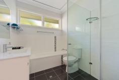 11 Crowther Ave Greenwich NSW 2065 A Stunning Home for all Seasons Newly renovated, high quality family home delivering style, space and light. Situated on the high side of a quiet street. Two separate and spacious living areas opening to the outdoors enable flexible family living. Upstairs, the large lounge/family room flows on to the deck providing a quiet retreat to enjoy the afternoon sun. Morning sun at the rear bathes the level lawns and established gardens. Bus to ferry, Lane Cove and North Sydney and 5 min walk to Pacific Highway, with connections to city, Chatswood, North Sydney and most North Shore Schools. Short walk to Greenwich Public School. Features Four bedrooms with built in robes Three bathrooms (two ensuite) Large kitchen and family room opening onto spacious covered entertaining deck with bushland views Downstairs lounge room and 4th bed bedroom with large ensuite Double brick construction Reverse cycle air conditioning Hardwood timber flooring throughout all living areas Wine cellar /work room or large storage room Beautiful easy maintenance gardens Lockup garage