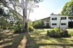 195-199 Beacon Rd North Tamborine QLD 4272 This is a well sized family home and a great kid friendly flat yard also
has a separate self-contained cottage which would be perfect for
Grandma or guests.... Main House * 5 bedrooms, all very spacious * 2 bathrooms, one on the living floor plus a 2-way off the master bedroom * Large formal lounge makes an ideal media room * Open plan lounge dining with cathedral ceilings & potbelly stove * Family sized kitchen with island bench and walk in pantry * Large deck upstairs off two of the bedrooms * Wide front veranda Ideal for BBQ's * Double carport plus extra under deck Cottage * One bedroom with ensuite bathroom * Combined lounge dining area * Neat kitchen * Covered veranda * Separate entrance driveway * Separate septic system The cottage is currently rented by a lovely lady who would like to stay if possible but will move on if necessa