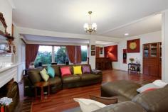 36 Dickasons Rd Heathmont VIC 3135 $640,000 Nestled at the end of a long drive awaits a magnificent opportunity.
If a private property with endless scope and possibilities is what
you're after, then wait no further. The pretty and spacious front
garden, with delightful veranda set the tone for this grand weatherboard
home. Enter to the large glassed-in entrance foyer which does not keep
secret of the huge open lounge and dining area featuring fire place, bar
and breathtaking views, be wowed by the sheer space and light of this
amazing area. Providing easy access to the kitchen/meals area with
walk in pantry and island bench, this open zone continues to delight
with views to the Dandenongs and access to cute outdoor landing to enjoy
your morning coffee perhaps? Enjoy the high ceilings of the
hallway to discover three large bedrooms with built in wardrobes, all
with sensational outlook and easy access to the main bathroom and
separate toilet. The large master bedroom features walk in robe and
ensuite as well as handy access to the front veranda. Accommodating to
all stages of the family life cycle, this unique residence provides a
huge upstairs second living area - featuring cathedral ceilings and
kitchenette the possibilities are truly endless with scope for rumpus
room, teenage retreat, home office or even multigenerational living. Step
outside to explore private hidden gardens that surround the 1139m2
(approx.) property and truly escape the hustle and bustle of life. From here you are also able to access the large workshop with electricity and water, and plenty of under house storage. Extra
amenities include; ducted heating, ducted vacuum, air-conditioning,
lock up garage with full mechanic work pit, double car port, plenty of
off street parking with drive through to Kenbry Road. Set in a
coveted pocket of Heathmont you are minutes' walk to Heathmont Railway
Station, Heathmont Village Shopping Centre and Dandenong Creek Trail, as
well as being spoilt for choice to Kindergarens, Primary and Secondary
Colleges. With Eastland Shopping Centre and access to Eastlink just a
few minutes' drive away you couldn't ask for more.