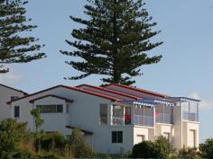Bermagui NSW 2546 Enjoy ocean views from the living area and balcony or a short walk over reserve (opposite) to an unspoiled beach, yet right in town. Each townhouse has a large upstairs patio to soak up the ocean and reserve views and the smell of the seaspray and a single garage with internal access. Unit 4 includes a purpose built (huge) boat store garage design for big boats, caravans or storage. A really lovely outlook in an outstandingly convenient location. Don't delay inspect today.