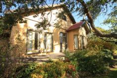 5 Mitchell Street Nyora VIC 3987 HUGE LAND HUGE POTENTIAL - 1717m2 As spacious as it is impressive, this c1920 solid brick home offers soaring ceilings, huge room sizes and an enormous back yard complete with chook yard and covered BBQ area along with the scope to return this once stately home into something truly special once again. Situated on 1716 sq metres (approx) of land the home is set back from the street with a leafy front garden and is a blank canvas to the rear with potential limited only by your imagination. Accommodation currently comprises 2 enormous bedrooms with excellent robes and storage, plus 2 other good sized bedrooms or perhaps use one as a study or rumpus room. With period features including ornate ceiling roses, open brick fireplace in the kitchen/meals area, wood fire in the spacious formal lounge, fully appointed kitchen includes 5 burner cooktop and oven, dishwasher and pantry. The bathroom includes laundry and is again very sizeable. A loft area awaits up the stairs and could easily be converted into an extra living or even working space. With some modifications already completed, this unique home is now ready and waiting for a new owner to complete the vision. General Features Property Type: House Bedrooms: 4 Bathrooms: 1 Land Size: 1717 m² (approx) Indoor Features Workshop Built-in Wardrobes Dishwasher Ducted Heating Open Fireplace Outdoor Features Carport Spaces: 1 Garage Spaces: 1
