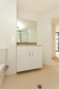 301/1 Mouat Street, LYNEHAM ACT 2602 $335,000 If you are looking for a great investment property or a stylish first home then this apartment may be perfect for you. On offer here is a great location. The Dickson shops and Southwell Park are within footsteps, while the City and CBD are a short drive away down Northbourne Avenue. This particular apartment is in a premier position within Axis. It is on floor eight of eleven, has great views over the surrounding suburbs and playing fields of Dickson and offers a 16 sq m wrap-around balcony that spans the full glass front of the apartment.