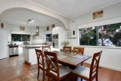 36 Dickasons Rd Heathmont VIC 3135 $640,000 Nestled at the end of a long drive awaits a magnificent opportunity.
If a private property with endless scope and possibilities is what
you're after, then wait no further. The pretty and spacious front
garden, with delightful veranda set the tone for this grand weatherboard
home. Enter to the large glassed-in entrance foyer which does not keep
secret of the huge open lounge and dining area featuring fire place, bar
and breathtaking views, be wowed by the sheer space and light of this
amazing area. Providing easy access to the kitchen/meals area with
walk in pantry and island bench, this open zone continues to delight
with views to the Dandenongs and access to cute outdoor landing to enjoy
your morning coffee perhaps? Enjoy the high ceilings of the
hallway to discover three large bedrooms with built in wardrobes, all
with sensational outlook and easy access to the main bathroom and
separate toilet. The large master bedroom features walk in robe and
ensuite as well as handy access to the front veranda. Accommodating to
all stages of the family life cycle, this unique residence provides a
huge upstairs second living area - featuring cathedral ceilings and
kitchenette the possibilities are truly endless with scope for rumpus
room, teenage retreat, home office or even multigenerational living. Step
outside to explore private hidden gardens that surround the 1139m2
(approx.) property and truly escape the hustle and bustle of life. From here you are also able to access the large workshop with electricity and water, and plenty of under house storage. Extra
amenities include; ducted heating, ducted vacuum, air-conditioning,
lock up garage with full mechanic work pit, double car port, plenty of
off street parking with drive through to Kenbry Road. Set in a
coveted pocket of Heathmont you are minutes' walk to Heathmont Railway
Station, Heathmont Village Shopping Centre and Dandenong Creek Trail, as
well as being spoilt for choice to Kindergarens, Primary and Secondary
Colleges. With Eastland Shopping Centre and access to Eastlink just a
few minutes' drive away you couldn't ask for more.
