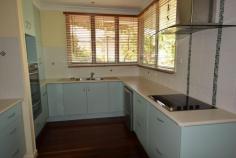 295 Agnes St The Range QLD 4700 $710,000 Tropical landscaped lawns and gardens surround this charming 4 bedroom, 2 bathroom home. This home is sure to delight and surprise all upon first inspection. Situated in highly sought after secluded Range position on 1764sqm fenced allotment this "family friendly" home has new kitchen and master bathroom with decks off both formal and informal living areas which are ideal for those whoe love to entertain. North East aspect with total privacy and position. Internal stairs lead down to double auto lock up car accommodation. Cubby house for the children and three bay insulated colorbond shed with power for the man in the family. Phone to inspect this immaculately presented home. - See more at: http://www.professionalsrockhampton.com.au/real-estate/property/755938/for-sale/house/qld/the-range-4700/295-agnes-street/#sthash.HeJXPnsx.dpuf